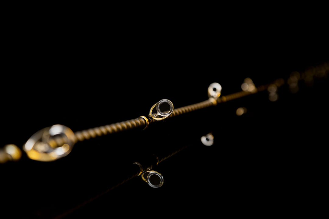 Close-up of Fuji Titanium SiC guides on Fishlogica Acid Parabol FAP-690ML T1100G blank