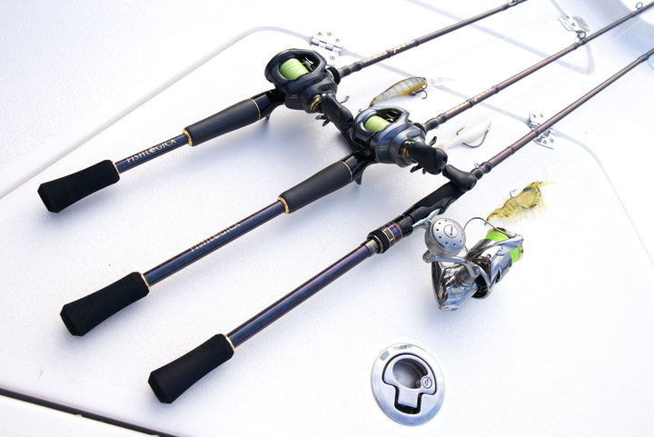 Three Fishlogica Icon FIC-735ML casting rods rigged for Barramundi fishing on a boat in Australia